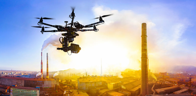 Drone flying in the sky - debunking the myths about drones - Consortiq