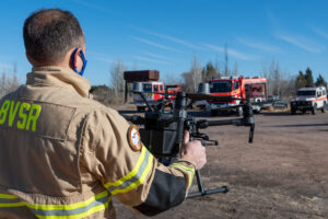 Fire fighters and first responders preparing to deploy a drone