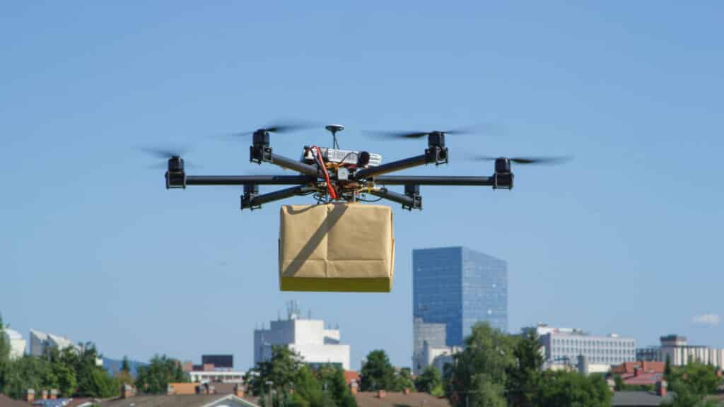 A drone delivery service delivering a package with a drone