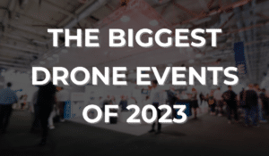 A photo of people wandering around a convention, with text overlay that reads "The Biggest Drone Events of 2023"